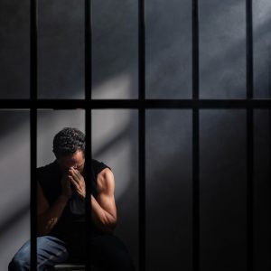 Middle aged man spending time in jail