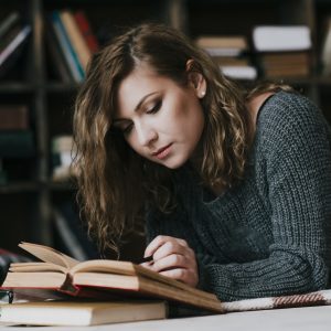 woman-reading-book-floor